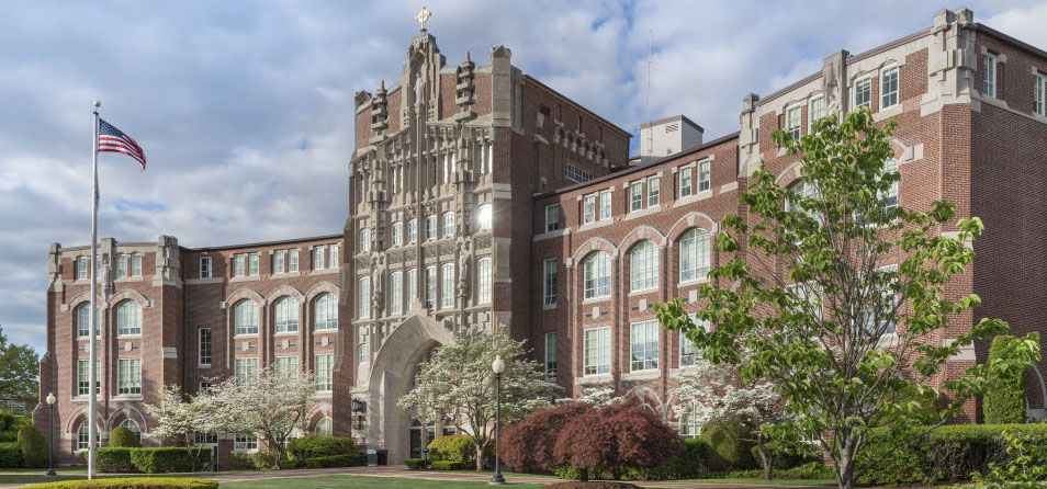 An exterior photo of Harkins Hall- the main administrative building at Providence College